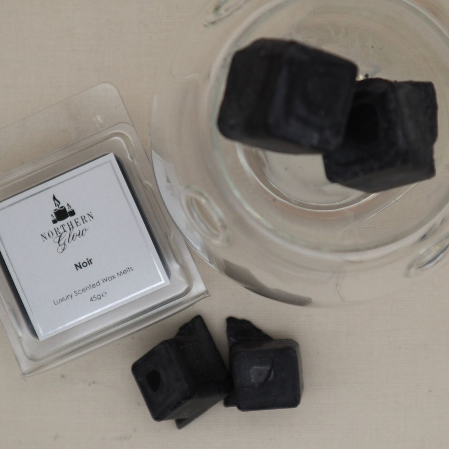 Clear glass wax melt burner with the black noir wax melt